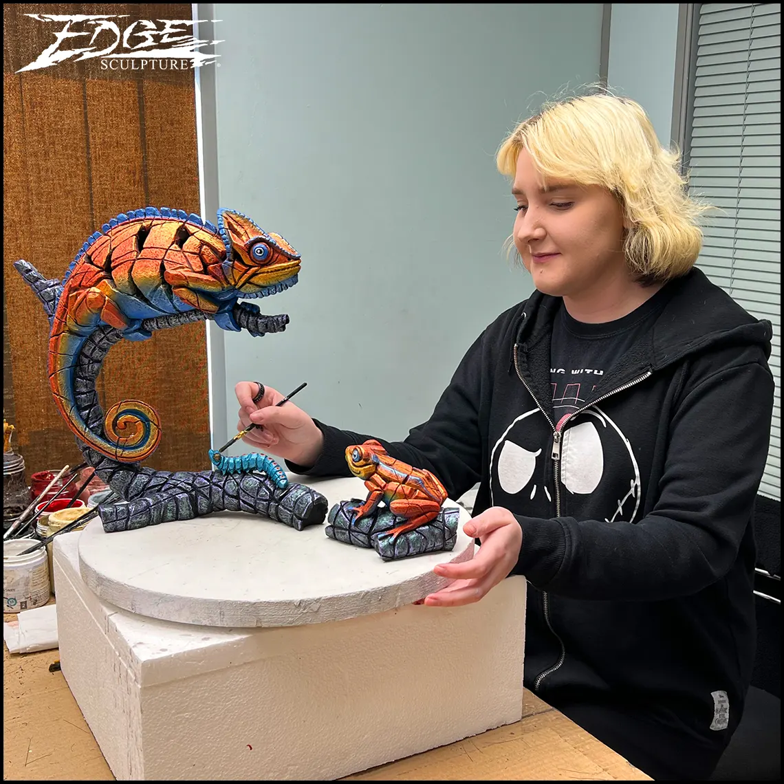 Sasha painting a limited edition chameleon 