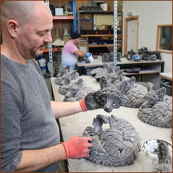 Simon our production manager assembling fox sculpture castings.