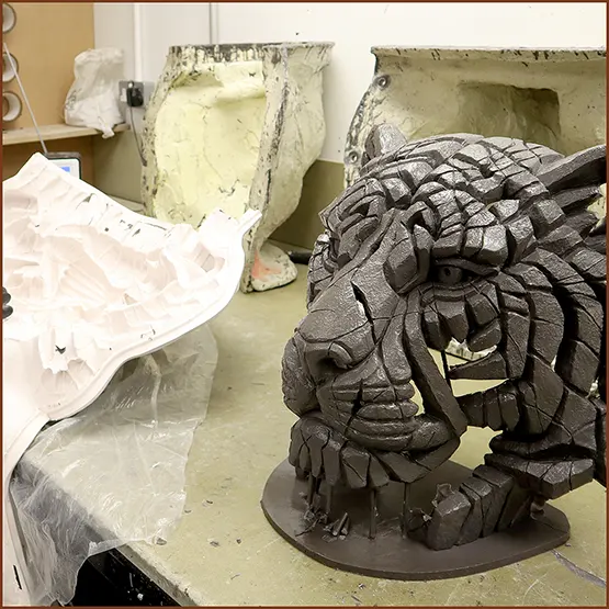Picture of a Siberian Tiger sculpture casting having been removed from a mould.
