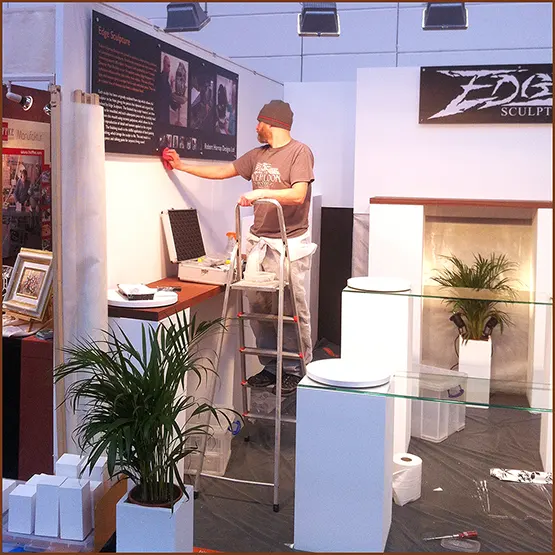 Dan Buckley building an Edge Sculpture exhibition display stand at a trade show