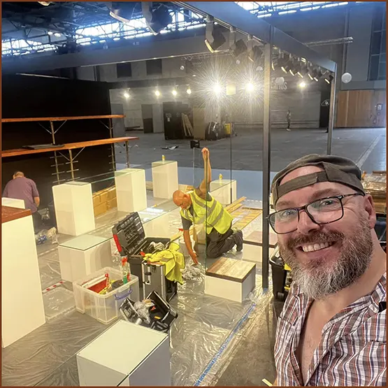 Matt Buckley, Dan Buckley and Paul Williamson building an Edge Sculpture exhibition display stand at a trade show