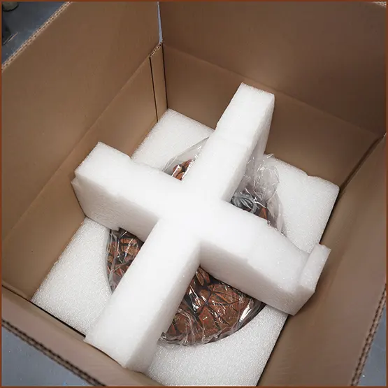 Picture of a painted Fox sculpture in stratocell packaging